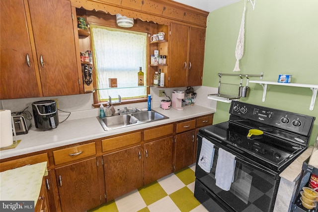 kitchen with sink and black range with electric cooktop