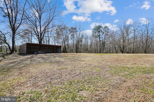 view of yard with an outbuilding and an outdoor structure