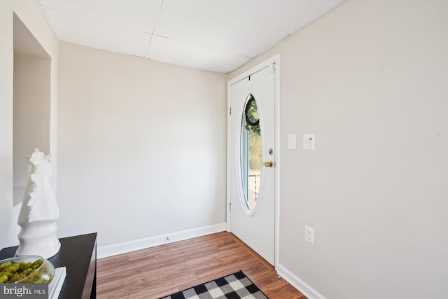 entrance foyer with light wood-type flooring and baseboards