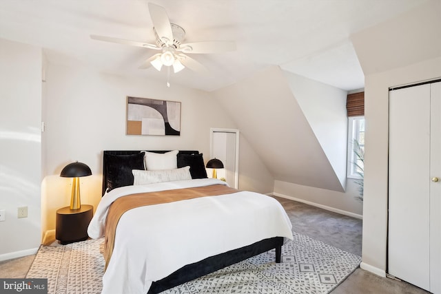 bedroom featuring carpet flooring, vaulted ceiling, and baseboards