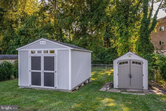 view of outdoor structure with a lawn