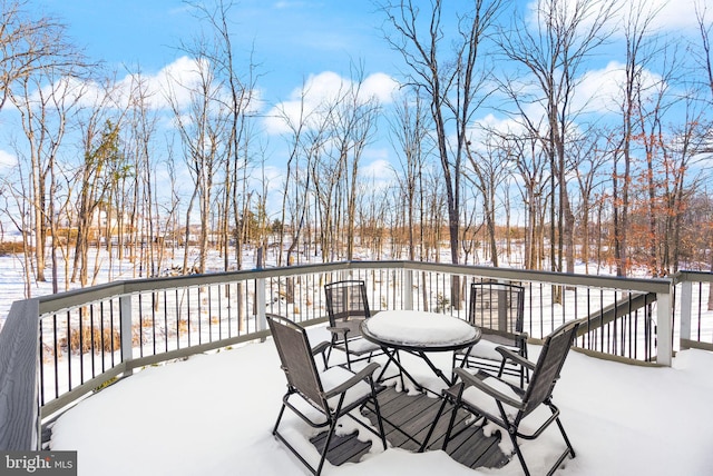 view of snow covered deck