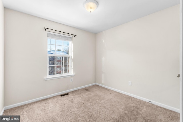 view of carpeted spare room