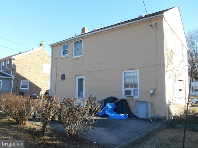 rear view of house with a patio