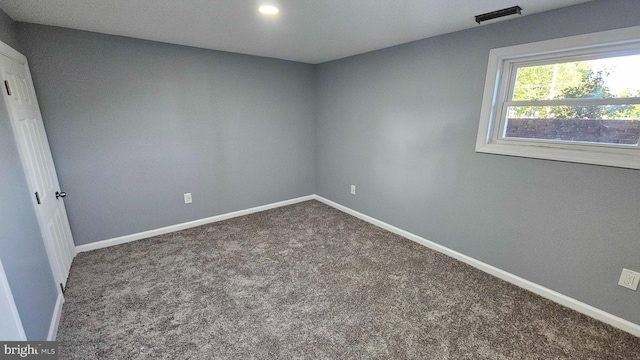 view of carpeted spare room