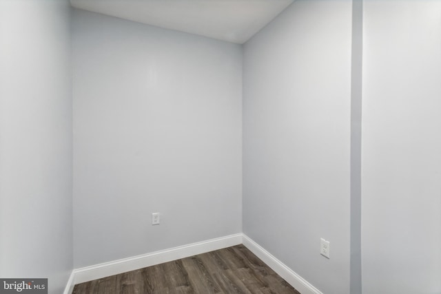 spare room featuring dark hardwood / wood-style floors