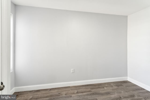 spare room featuring hardwood / wood-style floors