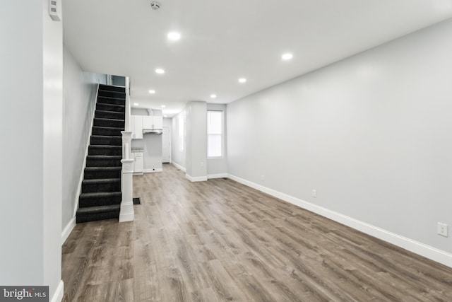 unfurnished living room featuring light wood-type flooring