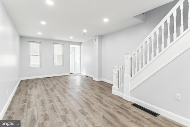 foyer entrance featuring light hardwood / wood-style floors