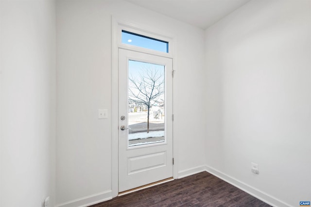 doorway with dark hardwood / wood-style floors