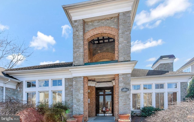 entrance to property featuring french doors