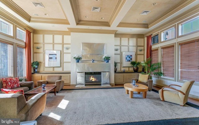 interior space with ornamental molding, coffered ceiling, and beam ceiling