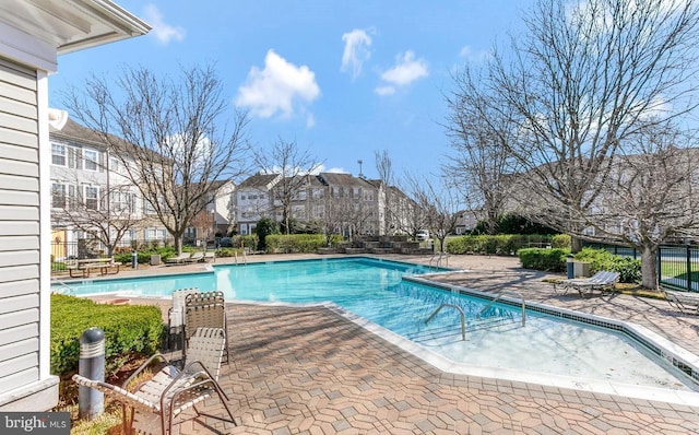 view of pool featuring a patio