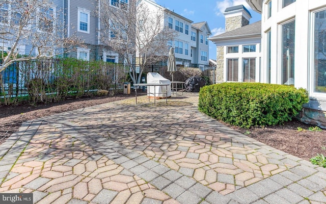 view of community with a patio area