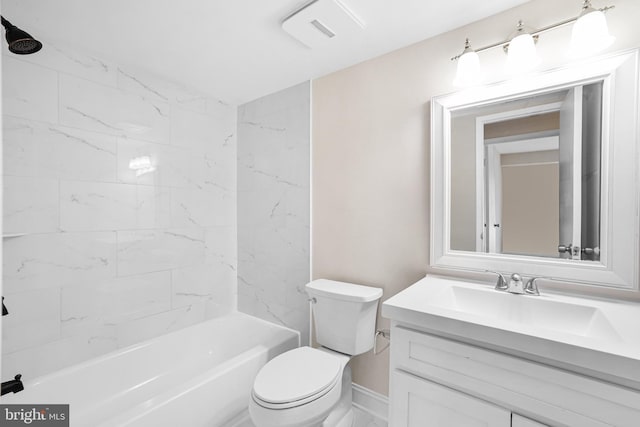 full bathroom with vanity, toilet, and tiled shower / bath combo