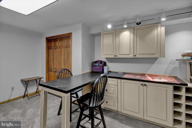 view of carpeted dining area