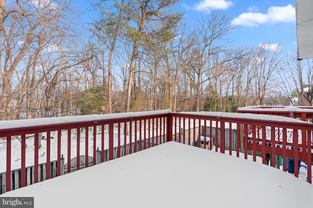 view of snow covered deck