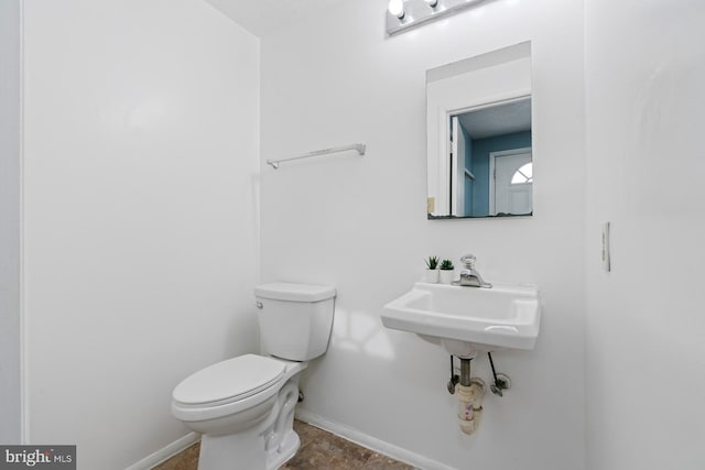 bathroom featuring toilet