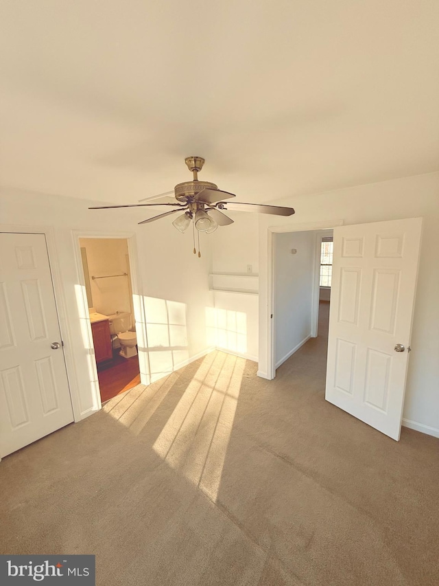 interior space with ceiling fan