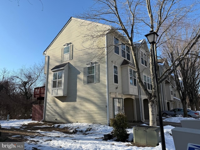 view of snow covered property