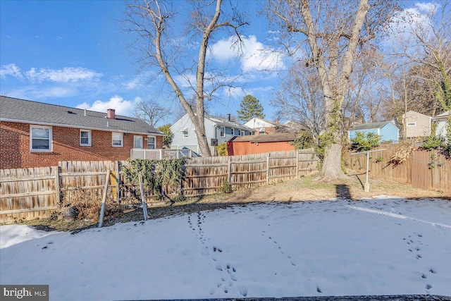 view of yard covered in snow