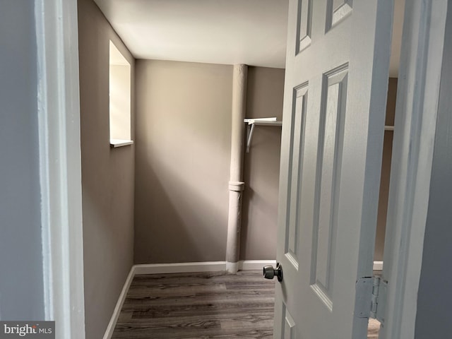 laundry room featuring hardwood / wood-style floors