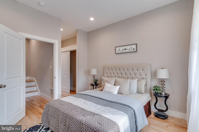 bedroom with light hardwood / wood-style floors