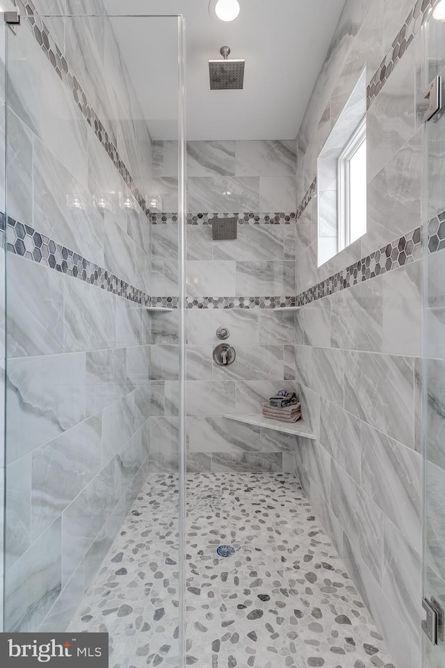 bathroom with walk in shower