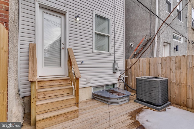 wooden terrace with central air condition unit