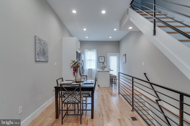 dining room with light hardwood / wood-style floors