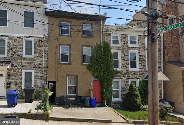 townhome / multi-family property with stucco siding