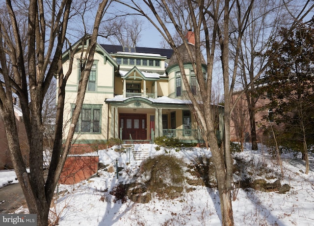 victorian home featuring a porch