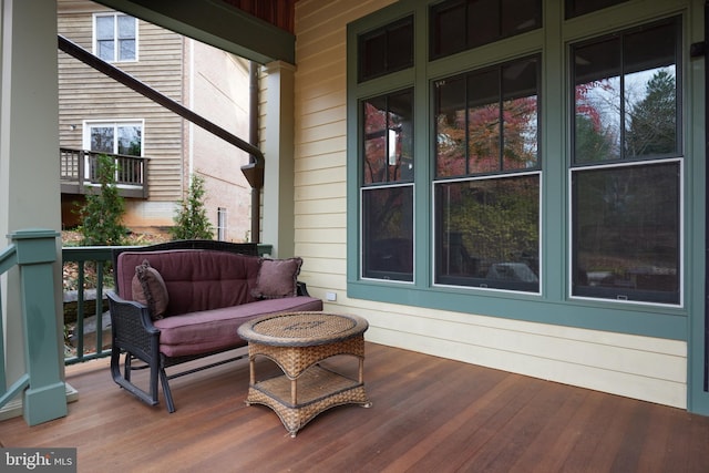 wooden terrace with a porch