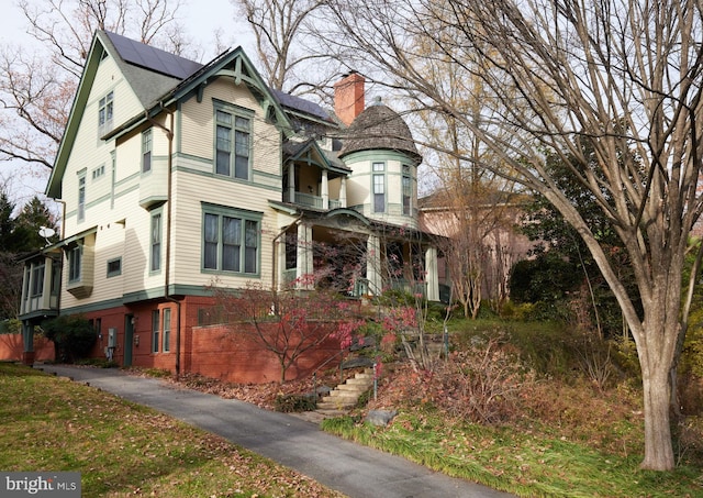 view of front of house with solar panels