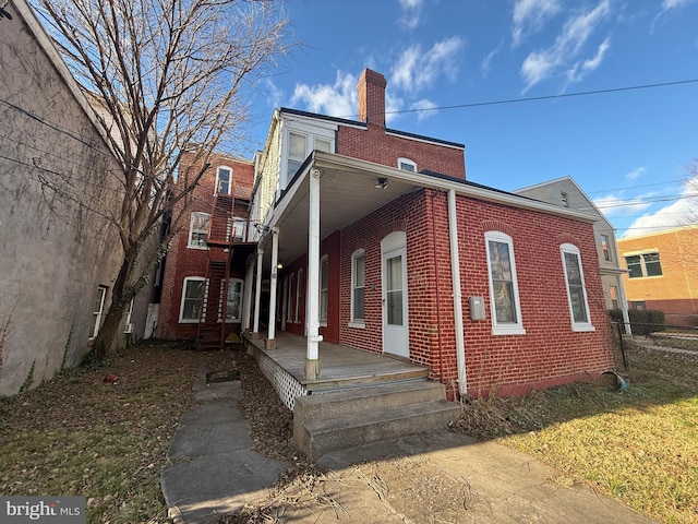 view of home's exterior with a porch