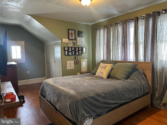 bedroom featuring dark hardwood / wood-style floors