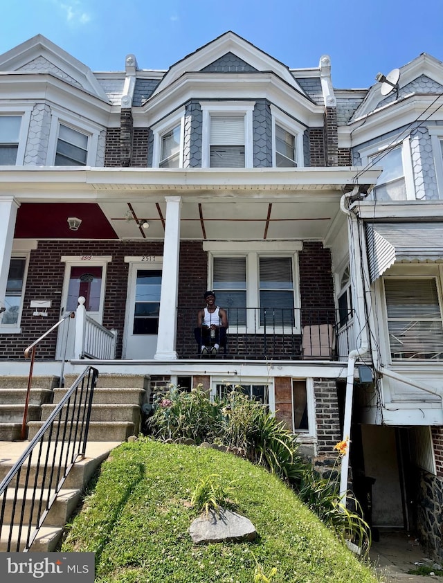 view of property with a porch