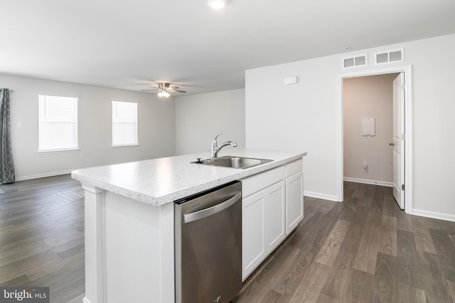 kitchen featuring white cabinets, dishwasher, a kitchen island with sink, ceiling fan, and sink