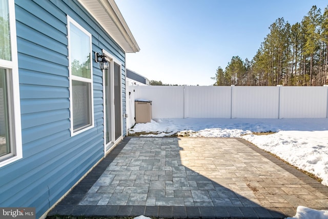 view of snow covered patio