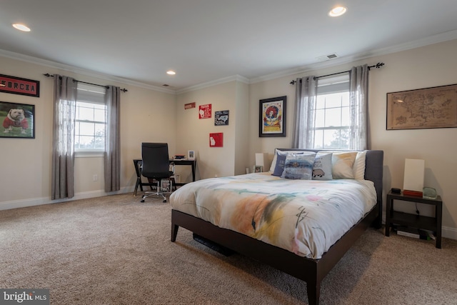 bedroom featuring crown molding and carpet flooring