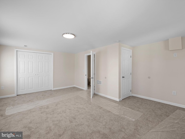 interior space with light colored carpet