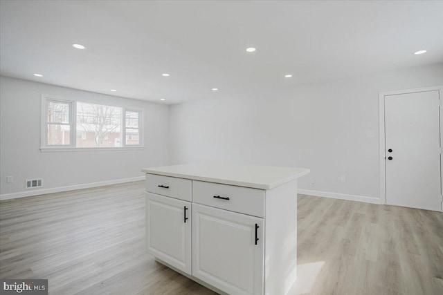 unfurnished room featuring light hardwood / wood-style flooring