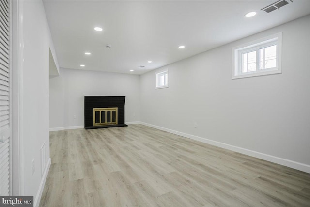 basement with light wood-type flooring