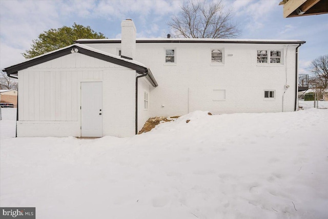 view of snow covered property