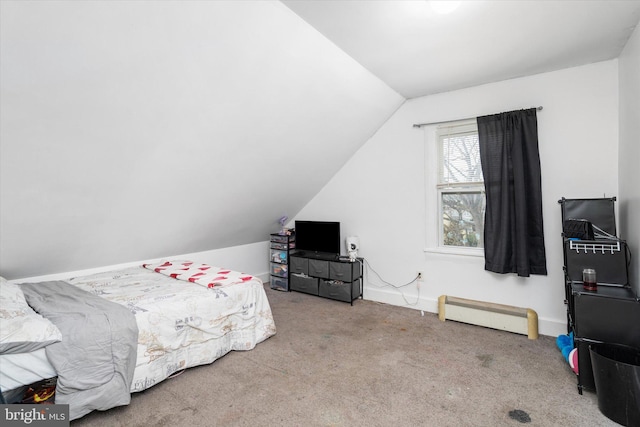 bedroom with light colored carpet and vaulted ceiling