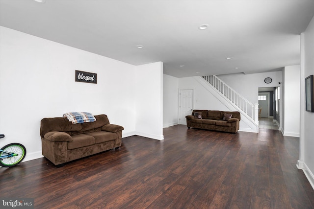 living area featuring dark wood-type flooring