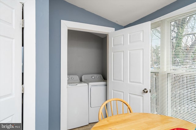 clothes washing area featuring washing machine and dryer