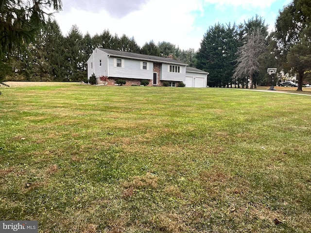 view of yard with a garage