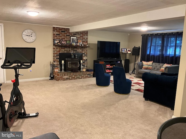 living room with a textured ceiling, carpet, and a wood stove