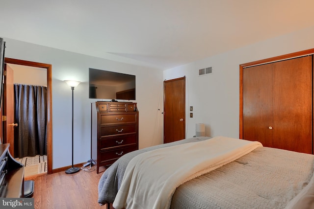 bedroom with light hardwood / wood-style floors